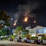 Drones derrubados sobre residência em Brasília, com viaturas da PMDF no local.